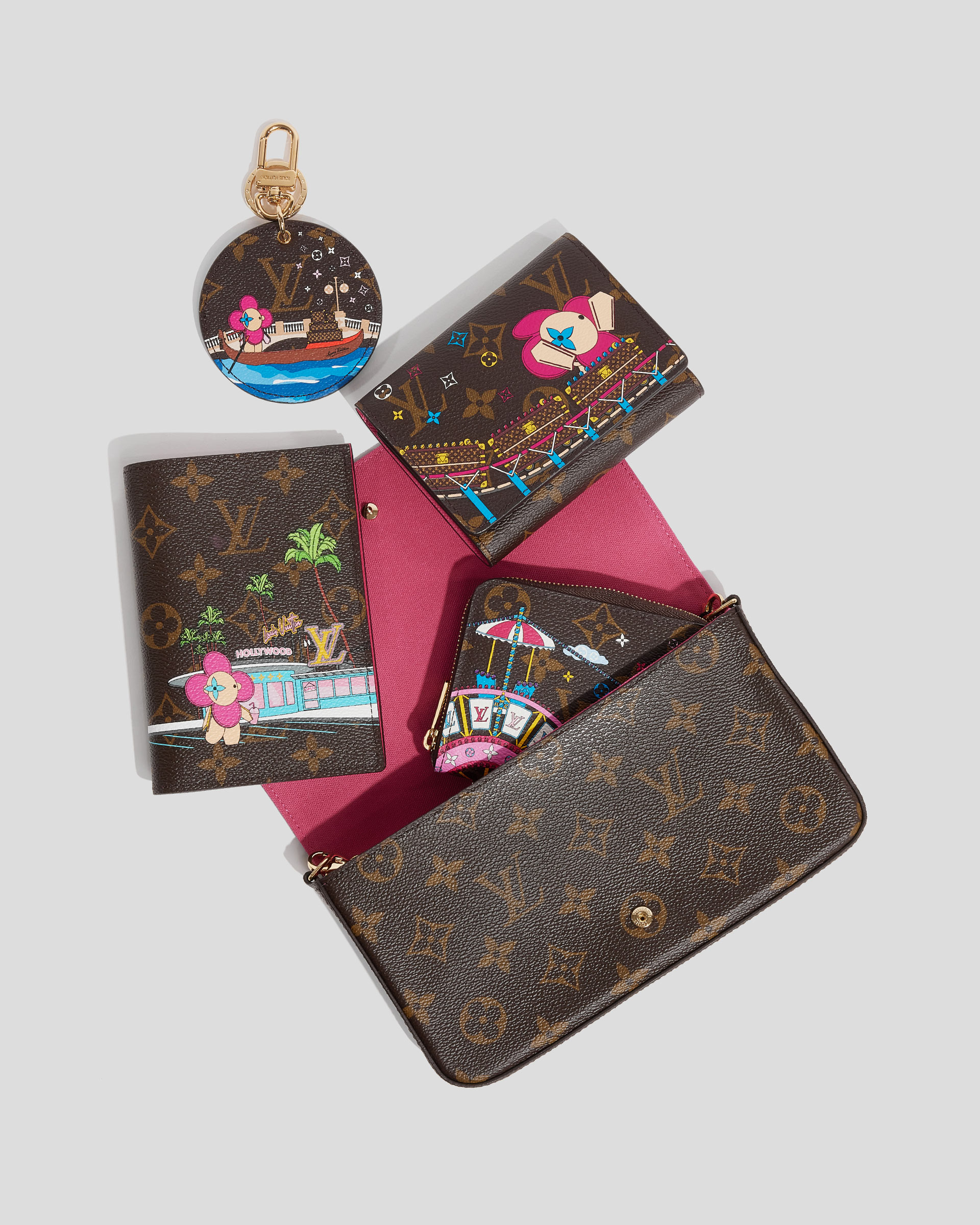 product flat lay image of Louis Vuitton Christmas Animation accessories FASHIONPHILE