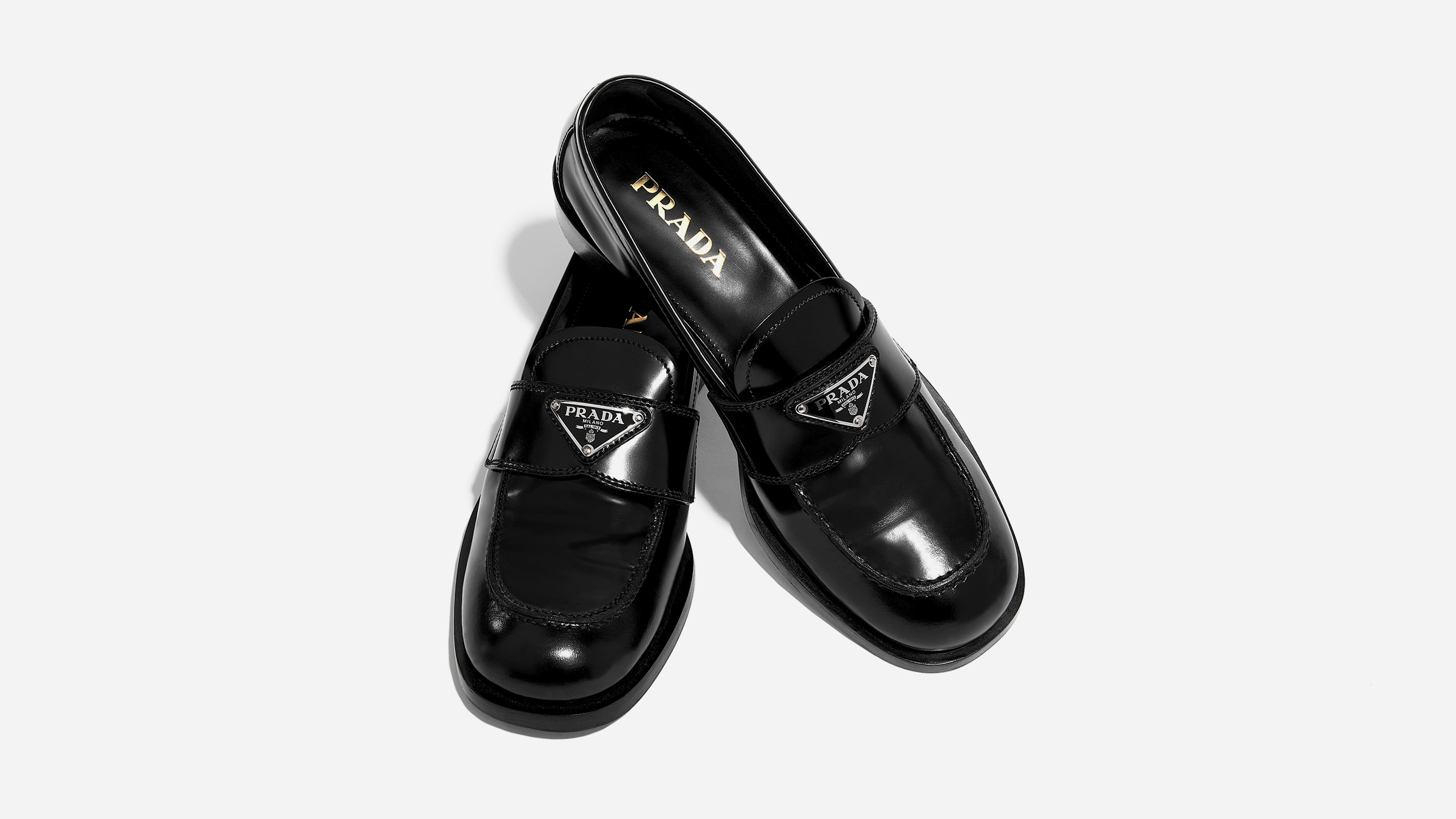 Womens Prada black Leather Triangle Loafers 55